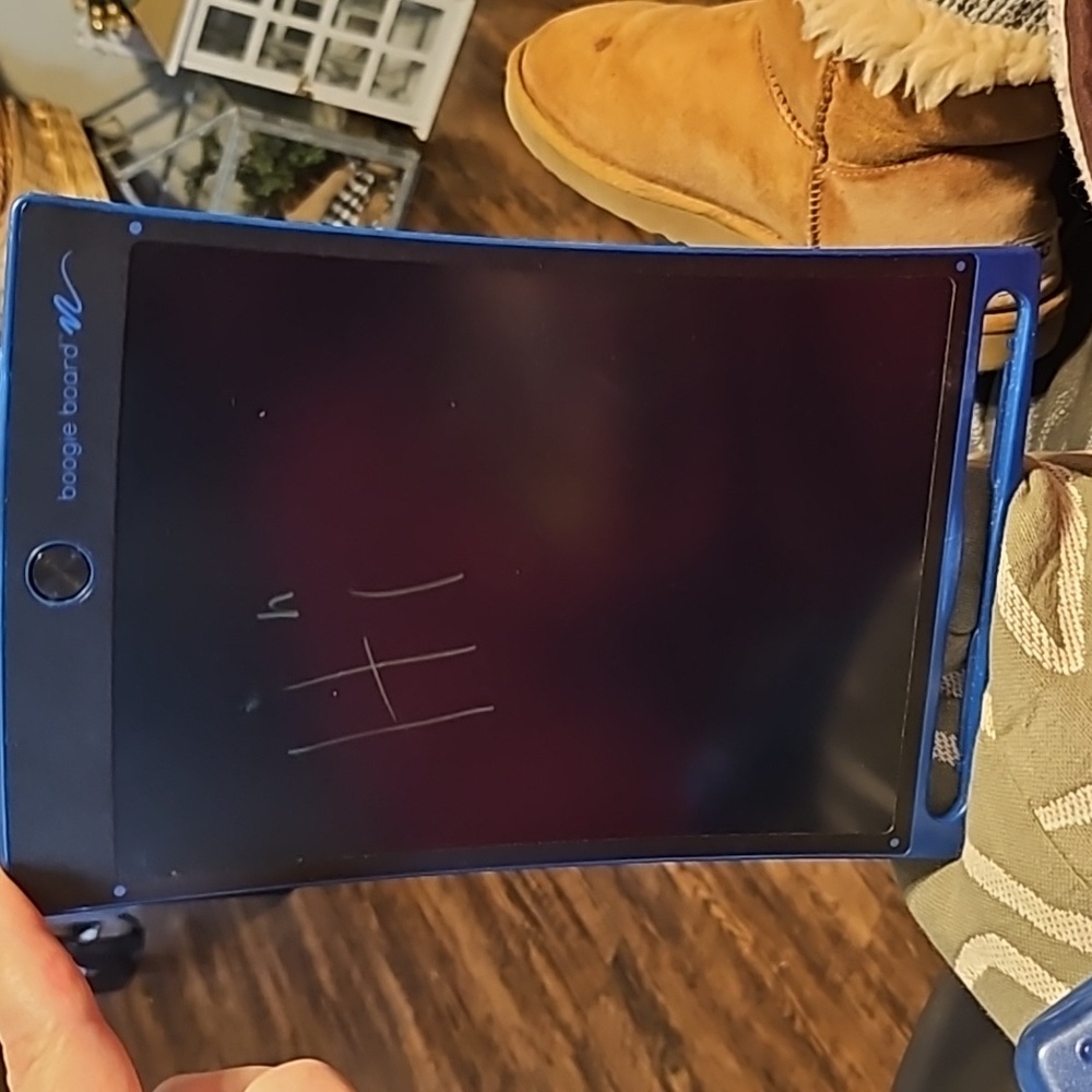 Blue boogie board. Works. No stylus